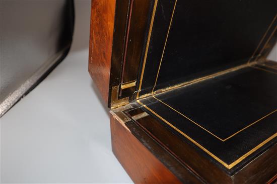 A burr walnut writing slope, with leather slope, inlaid plaque for C. Roberts